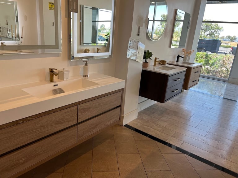 Modern luxury bathroom with double vanity, quartz countertop, and large windows